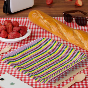 Rood en sinaasappel inpakpapier met een glanzende papieren bordje