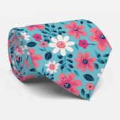 Rood en wit bloemontwerp op lichtblauw stropdas (Opgerold)