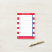 Rood en wit gestreept werk post-it® notes (Op bureau)
