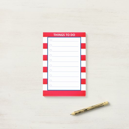 Rood en wit gestreept werk post-it® notes (Op bureau)