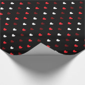 Rood en wit harten op zwart cadeaupapier (Hoek)