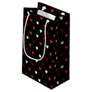Rood en wit harten op zwart klein cadeauzakje