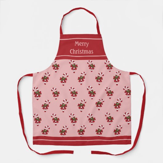 Rood en wit kerstsnoeppatroon op roze schort (Voorkant)