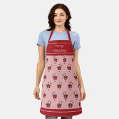 Rood en wit kerstsnoeppatroon op roze schort (Gedragen)
