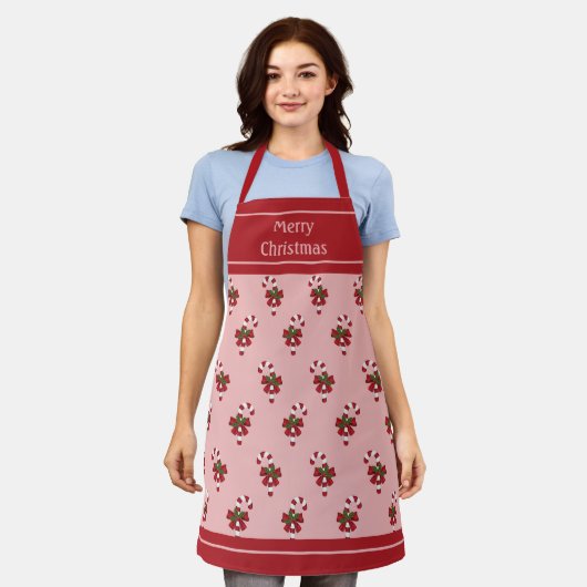 Rood en wit kerstsnoeppatroon op roze schort (Gedragen)