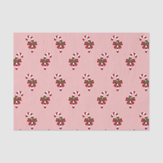 Rood en wit kerstsnoeppatroon op roze tissuepapier (Voorkant)