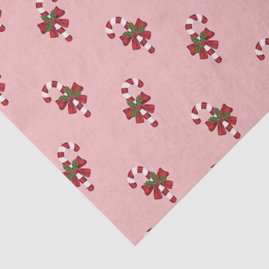 Rood en wit kerstsnoeppatroon op roze tissuepapier (Detail)