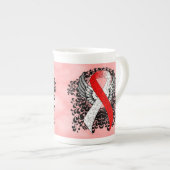 Rood en wit lint met vleugels porselein kop (Voorkant rechts)