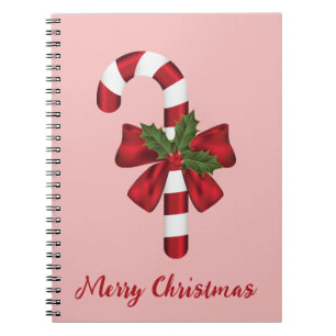 Rood en wit snoepje met vrolijke kersttekst notitieboek
