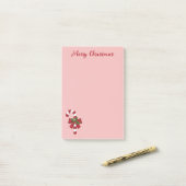 Rood en wit snoepje met vrolijke kersttekst post-it® notes (Op bureau)