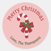 Rood en wit snoepje met vrolijke kersttekst ronde sticker (Voorkant)