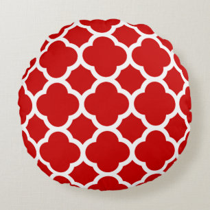 Rood en wit vierbladpatroon rond kussen