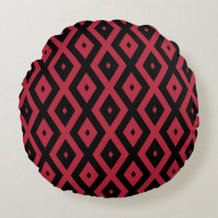 Rood- en zwart diamantpatroon rond kussen