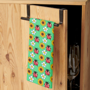 Rood en zwart lieveheersbeestje met bloemen theedoek