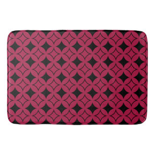 Rood- en zwarte schild badmat