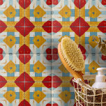 Rood Geel Blauw Geometrisch Patroon Tegeltje<br><div class="desc">Deze keramische tegel toont een levendig en symmetrisch design. Het patroon is samengesteld uit gedurfde rode diamanten in het midden, omringd door gele diamantvormen met centrale uitsparingen. Deze vormen creëer een opvallend contrast tegen elkaar. Blauwe strepen snijden elkaar in rechte hoeken rond de gele diamanten, en omlijsten ze elegant. De...</div>
