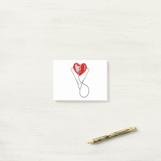Rood hart en stethoscoop post-it® notes (Op bureau)