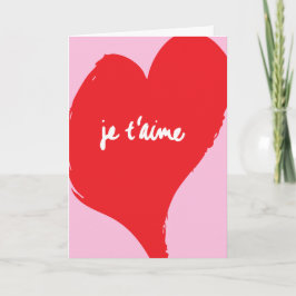 Rood hart met je t’aime-tekst op roze achtergrond kaart