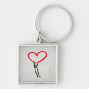 Rood hart met stokfiguur, leven op alles wat je no sleutelhanger