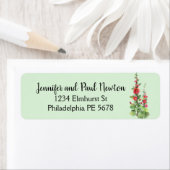 Rood hollyhock met lichtblauw label voor retouradr (Insitu)