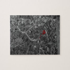 Rood kardinaal in een zwarte en witte boom legpuzzel