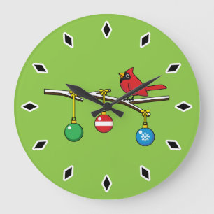 Rood kardinaal op kerstbaltak grote klok