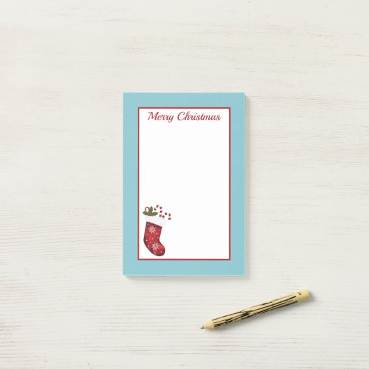 Rood kerstcadeau met blauwe en aangepaste tekst post-it® notes (Op bureau)