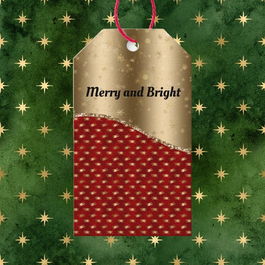 Rood kerstflesje met gouden lint en naam cadeaulabel