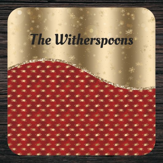 Rood kerstflesje met gouden lint en naam kartonnen onderzetters