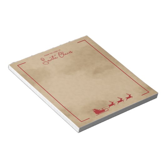 Rood kersthoes op oud papier met oude kleuren notitieblok (Schuin)