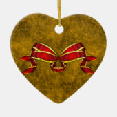 Rood kerstlint op goud keramisch ornament (Voorkant)