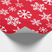 Rood kerstpapier met sneeuwvlokken cadeaupapier (Hoek)