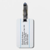 Rood leerpotlood op gelaagd papier met naam bagagelabel (Achterkant verticaal)