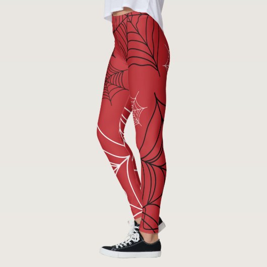 Rood met zwarte en witte spiderwebben Halloween Leggings (Links)