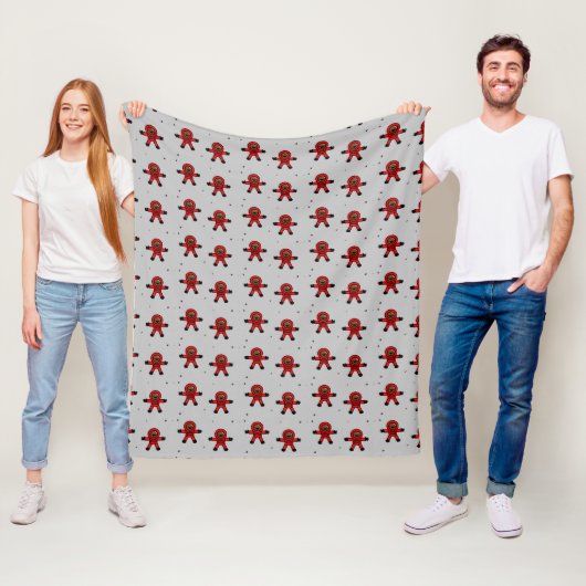 Rood pak astronauten op grijs fleece deken (In situ)