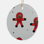Rood pak astronauten op grijs keramisch ornament (Links)
