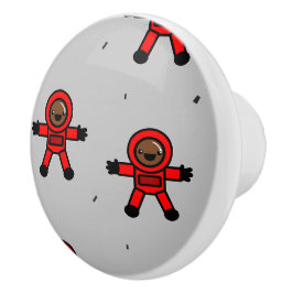 Rood pak astronauten op grijs keramische knop