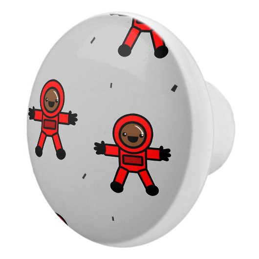 Rood pak astronauten op grijs keramische knop (Rechts)