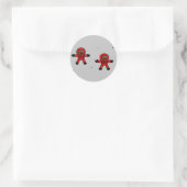 Rood pak astronauten op grijs ronde sticker (Tas)