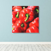 Rood - paprika's canvas afdruk (Insitu (Houten vloer))