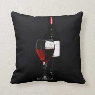 Rood wijnglas en fles kussen