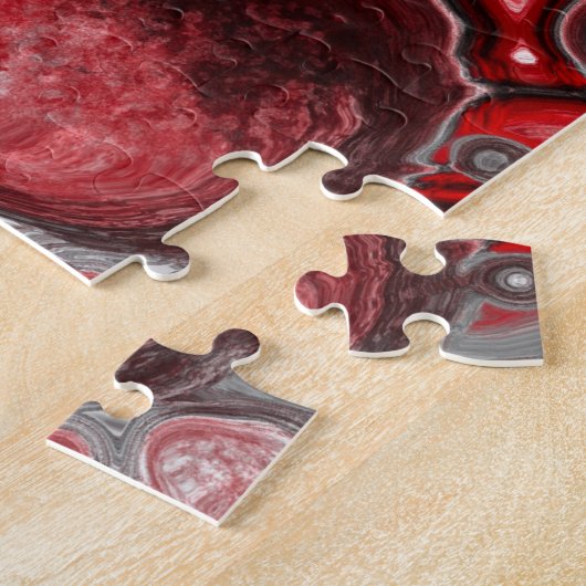 Rood, wit en zwart-witschilderende fluïde kunst legpuzzel (Zijkant)