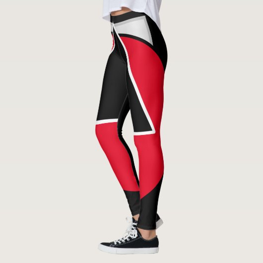 Rood, zwart en wit leggings (Links)
