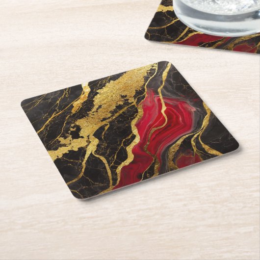 Rood zwart marmeren patroon met goud kartonnen onderzetters (Schuin)