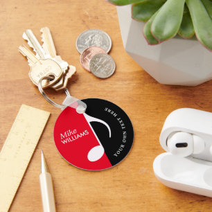 rood/zwart muzieksymbool op sleutelhanger met naam