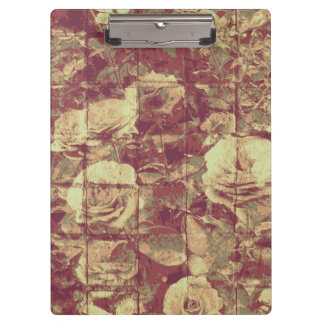 Roos camouflage patroon op gebetonde wandachtergro klembord