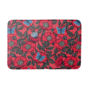 Roos en vlinders in rood en blauw badmat