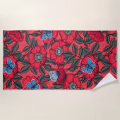 Roos en vlinders in rood en blauw strandlaken (Voorkant)