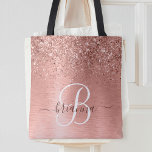 Roos Gold Pensed Metal Glitter Monogram Naam Tas<br><div class="desc">Maak dit trendy ontwerp van de canvas tas met  roos gouden mousserende glitter gemakkelijk aan te passen op een roos gouden geborstelde metalen achtergrond.</div>