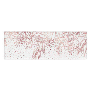 Roos gouden handgetekende florale doodles en confe naambadge
